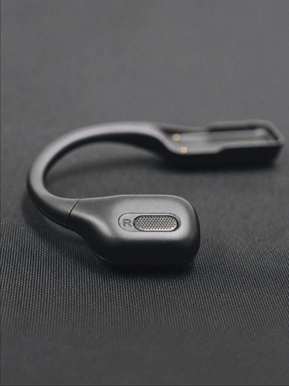 Close-up of the earphone used in DEEPLUM F1 smart glasses.